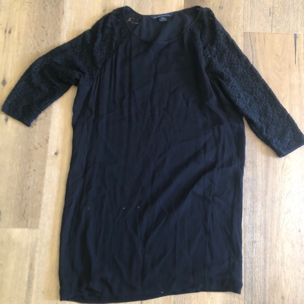 Little black dress with lace sleeves